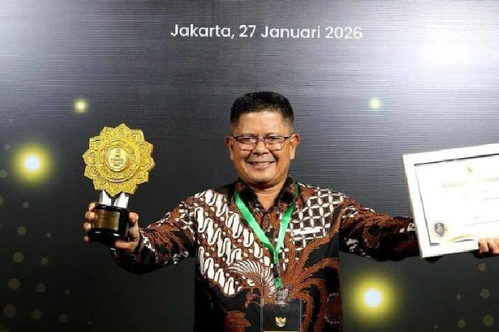 Bupati Pasaman Welly Suhery Terima UHC Award 2026
