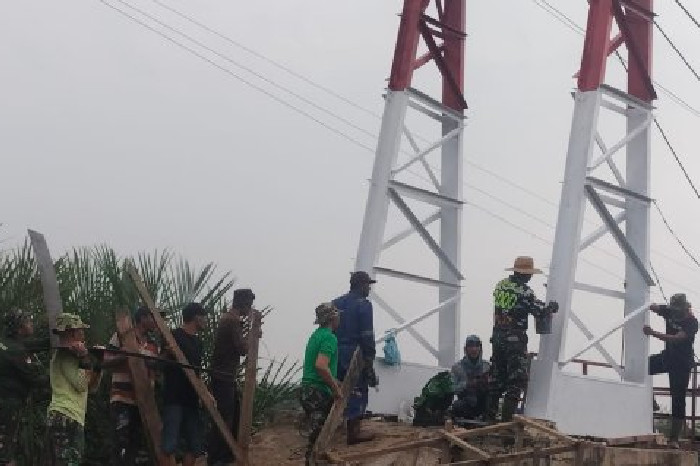 TNI AD Selesaikan Rehab Jembatan Gantung Dogang, Akses Warga Pulih