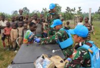 Satgas TNI Konga Gelar Pengobatan Gratis dan Bantuan Warga Maliobongo